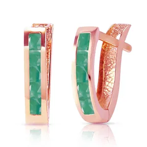 14K. SOLID ROSE GOLD OVAL HUGGIE EARRING WITH EMERALDS