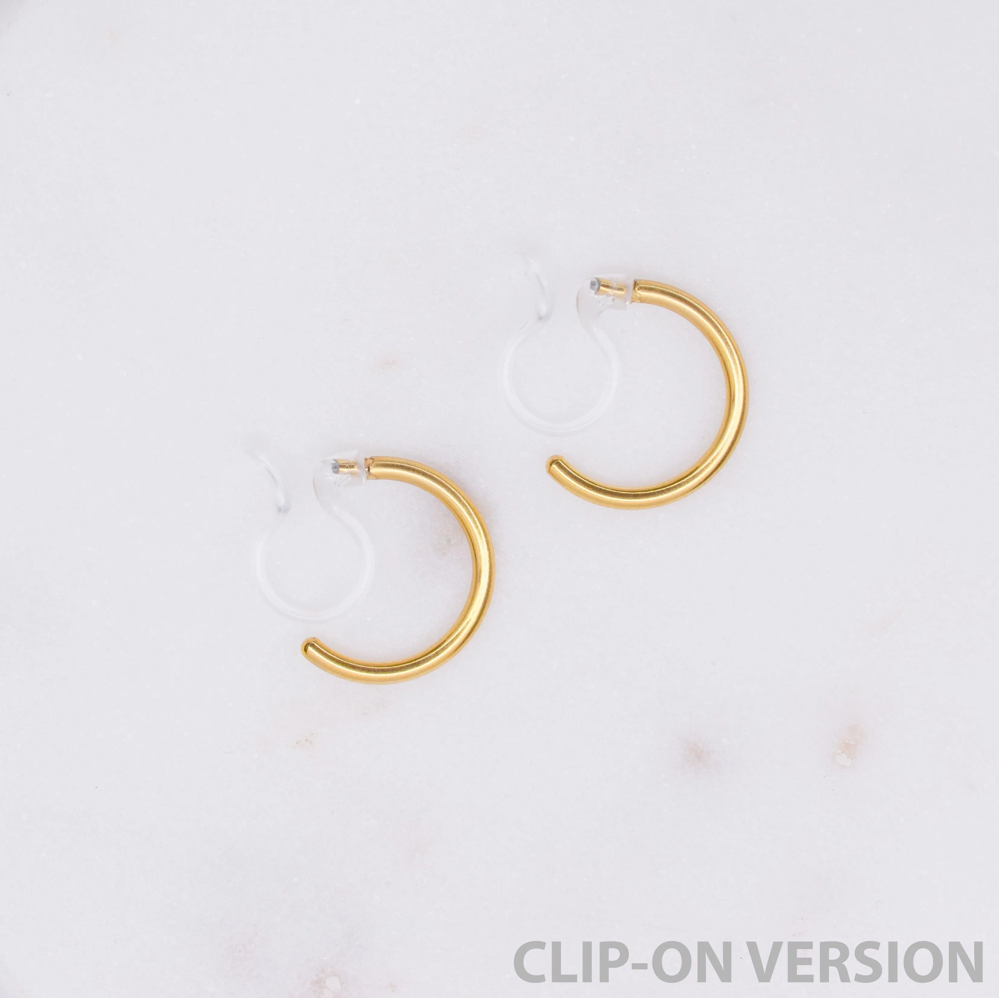 HUGGIE HOOP CLIP-ON EARRINGS IN GOLD