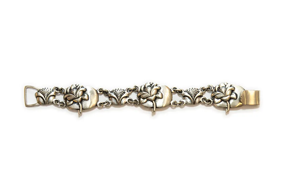 McCLELLAND BARCLAY Sterling Silver Repoussé Flower Bracelet